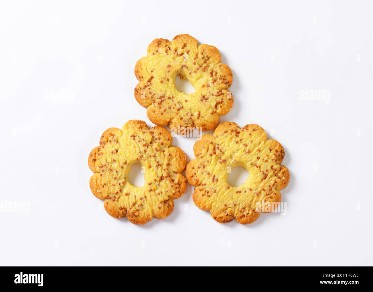 three italian butter cookies Canestrelli on white background Stock Photo