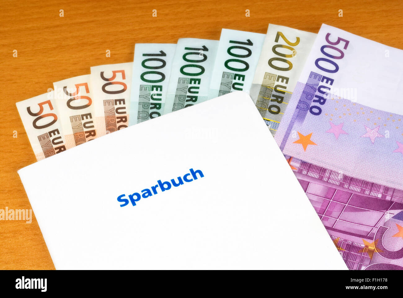 Savings book and Euro bills Stock Photo
