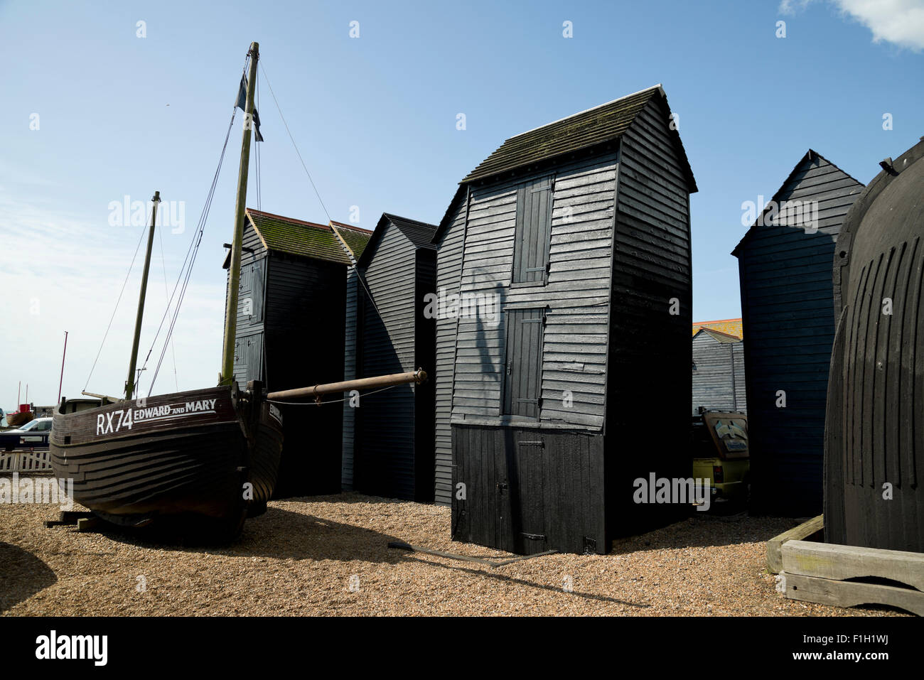 Net Shops on Hastings beach in Sussex. These tall wooden sheds are used by fishermen to store their nets and ropes. Stock Photo