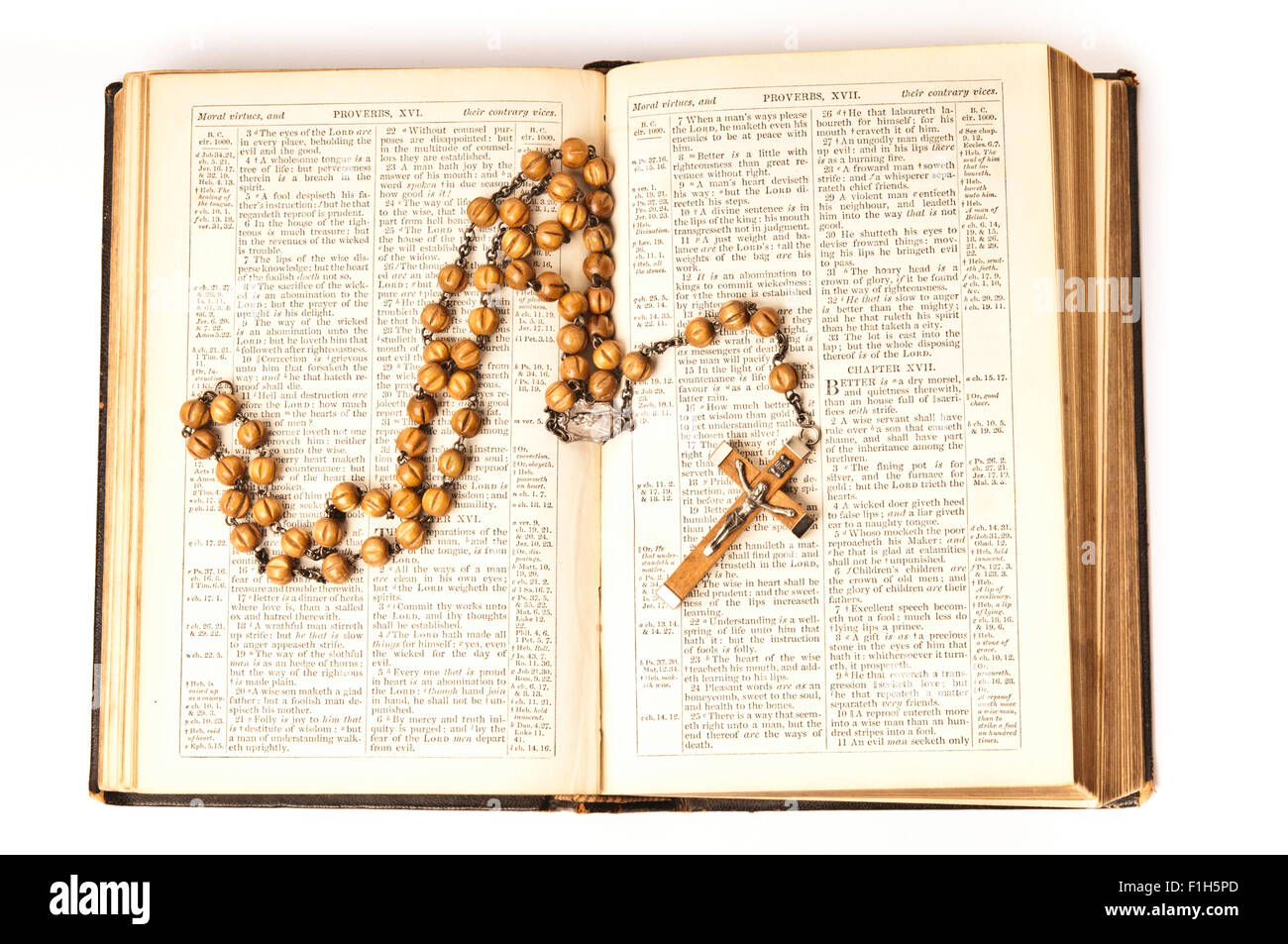 rosary on bible, isolated Stock Photo