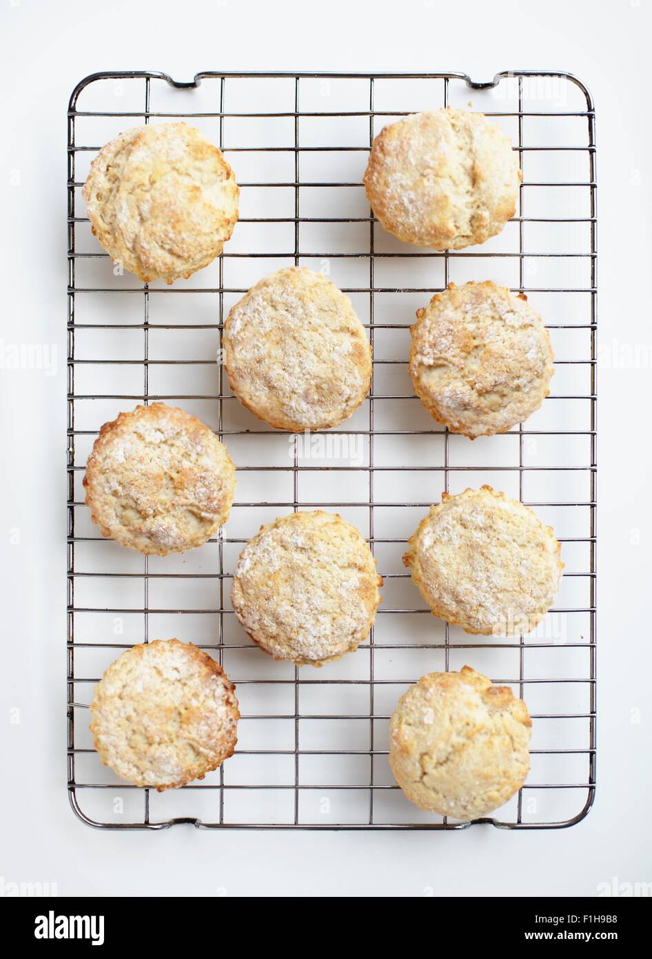 Overhead view of freshly baked scones on cooling rack Stock Photo