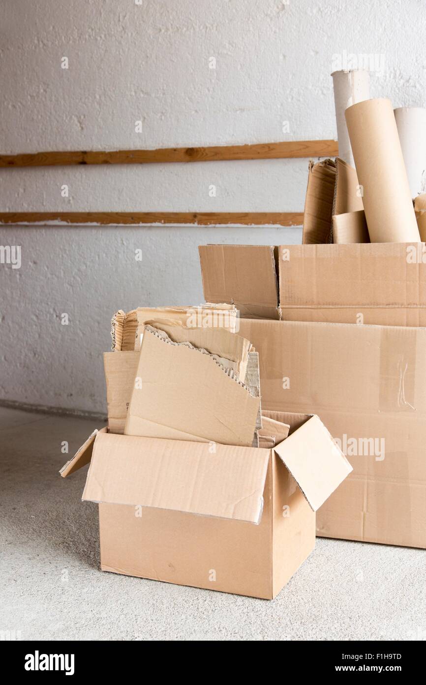 Full cardboard boxes in garage for recycling Stock Photo Alamy