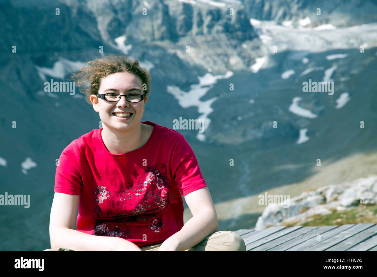 teenage girl in the Swiss Alps in Summer in Flims Stock Photo