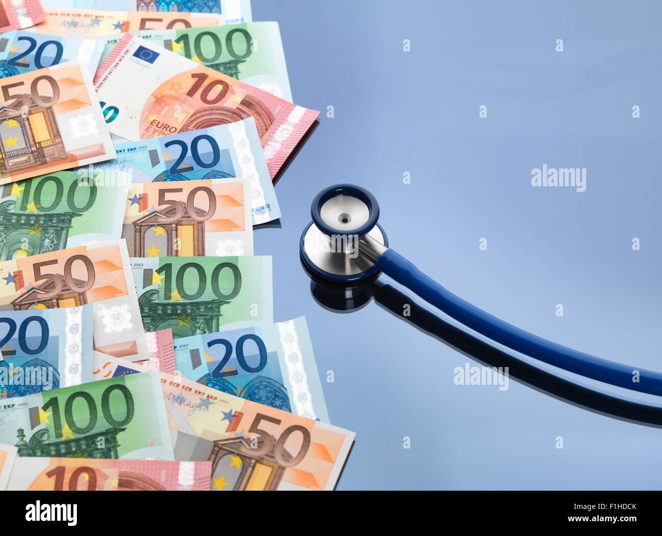 Stethoscope with euro currency notes Stock Photo