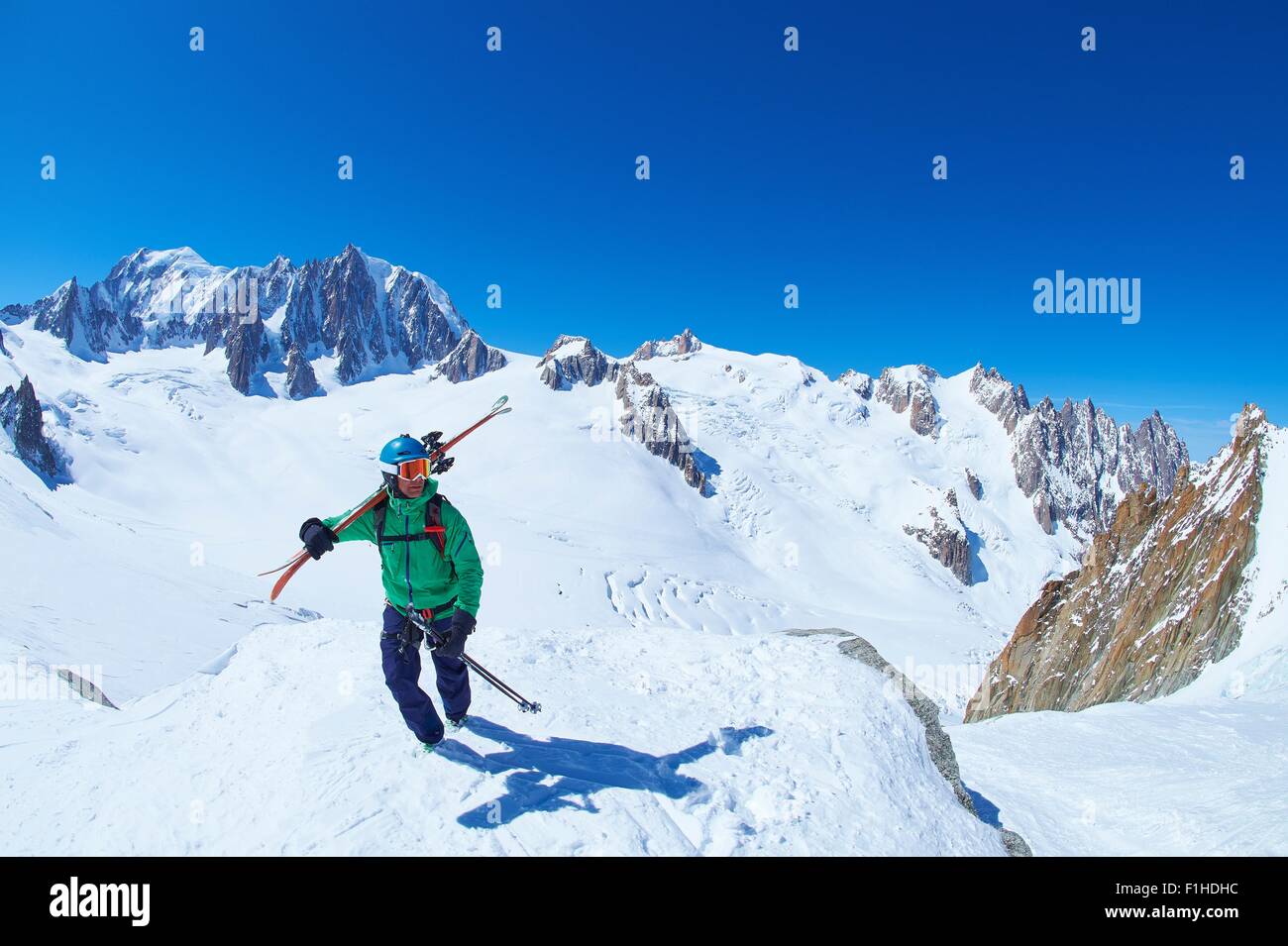 Mature male skier on ridge at Mont Blanc massif, Graian Alps, France Stock Photo