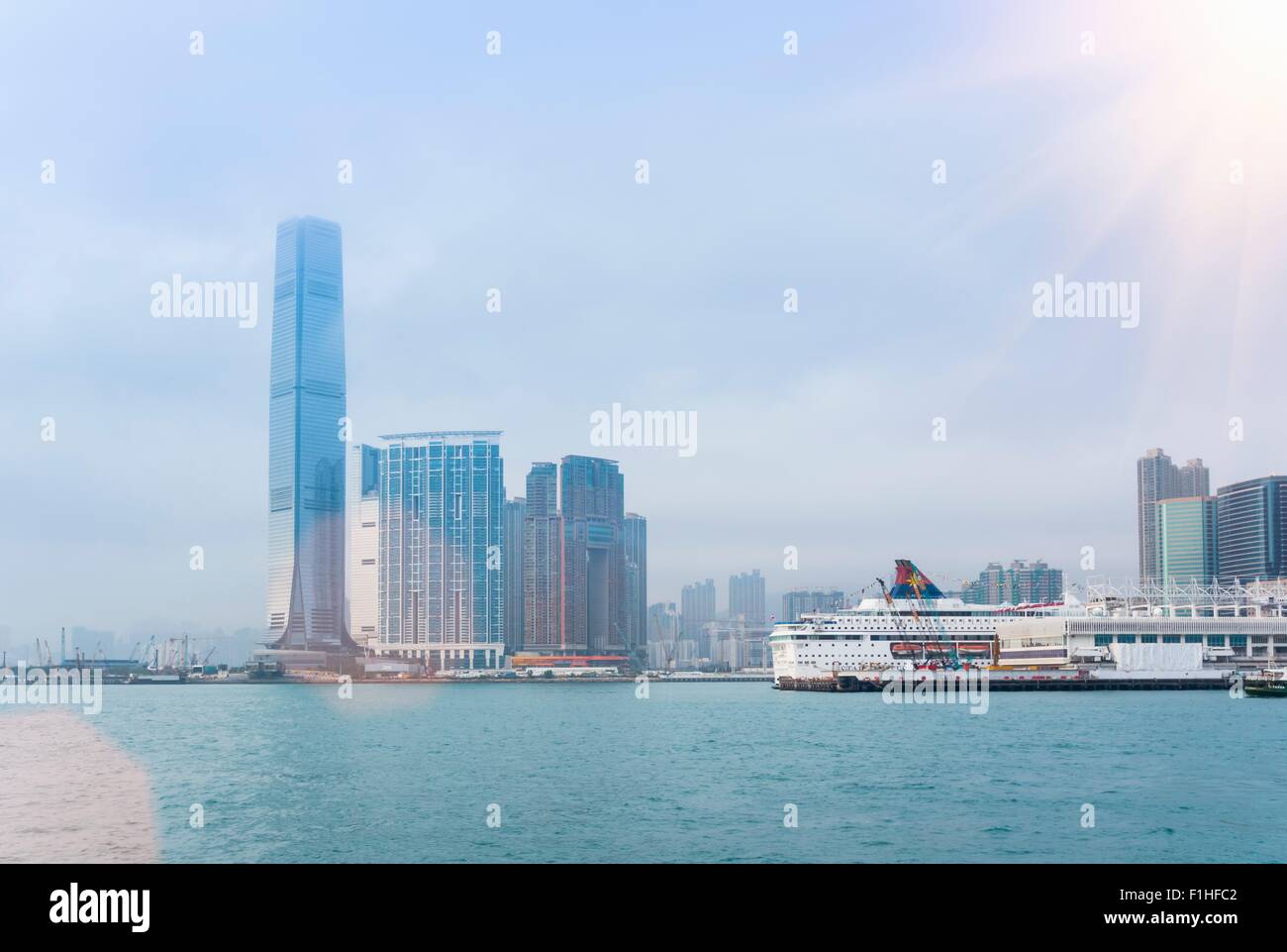 View of Kowloon skyline across Victoria Harbour, Hong Kong, China Stock Photo