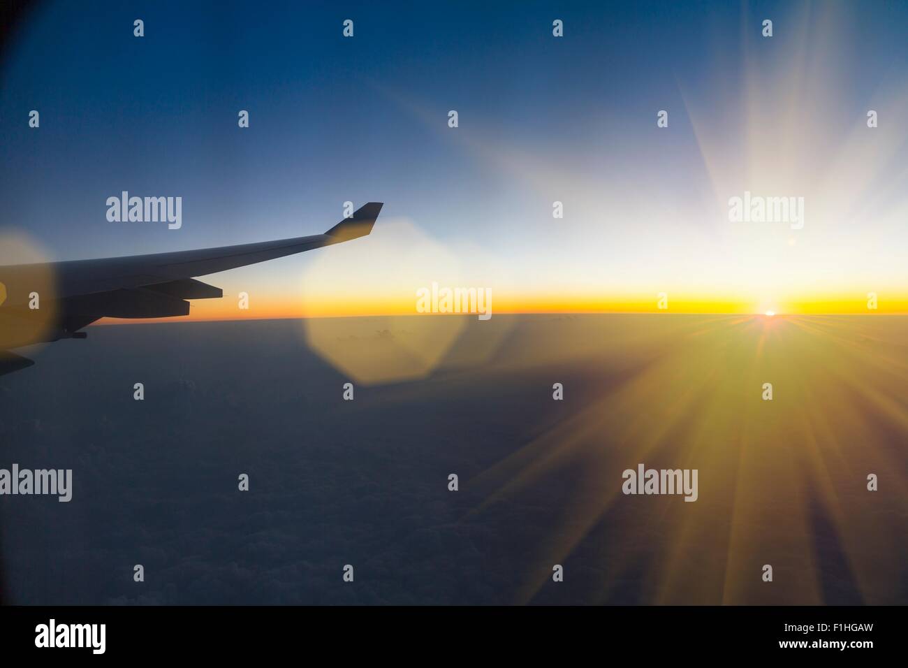 Aeroplane wing seen from inside aeroplane Stock Photo