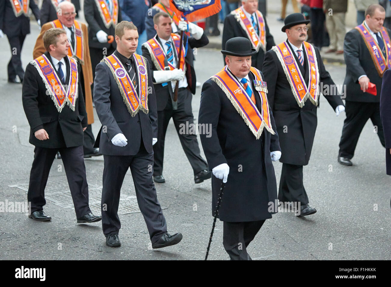 Members of the Orange Order London District march past the Cenotaph on