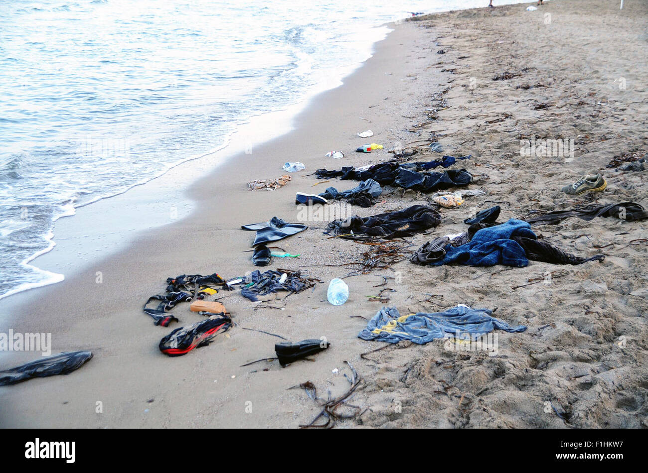 Ankara, Turkey. 2nd Sep, 2015. Belongings of Syrian refugees are seen on a beach in Bodrum town of Mugla province, Turkey, on Sept. 2, 2015. Eleven Syrian refugees drowned and five others were missing on Wednesday when two boats separately sank in the Aegean Sea off western Turkey, private Dogan news agency reported. Credit:  Merit Macit/Xinhua/Alamy Live News Stock Photo