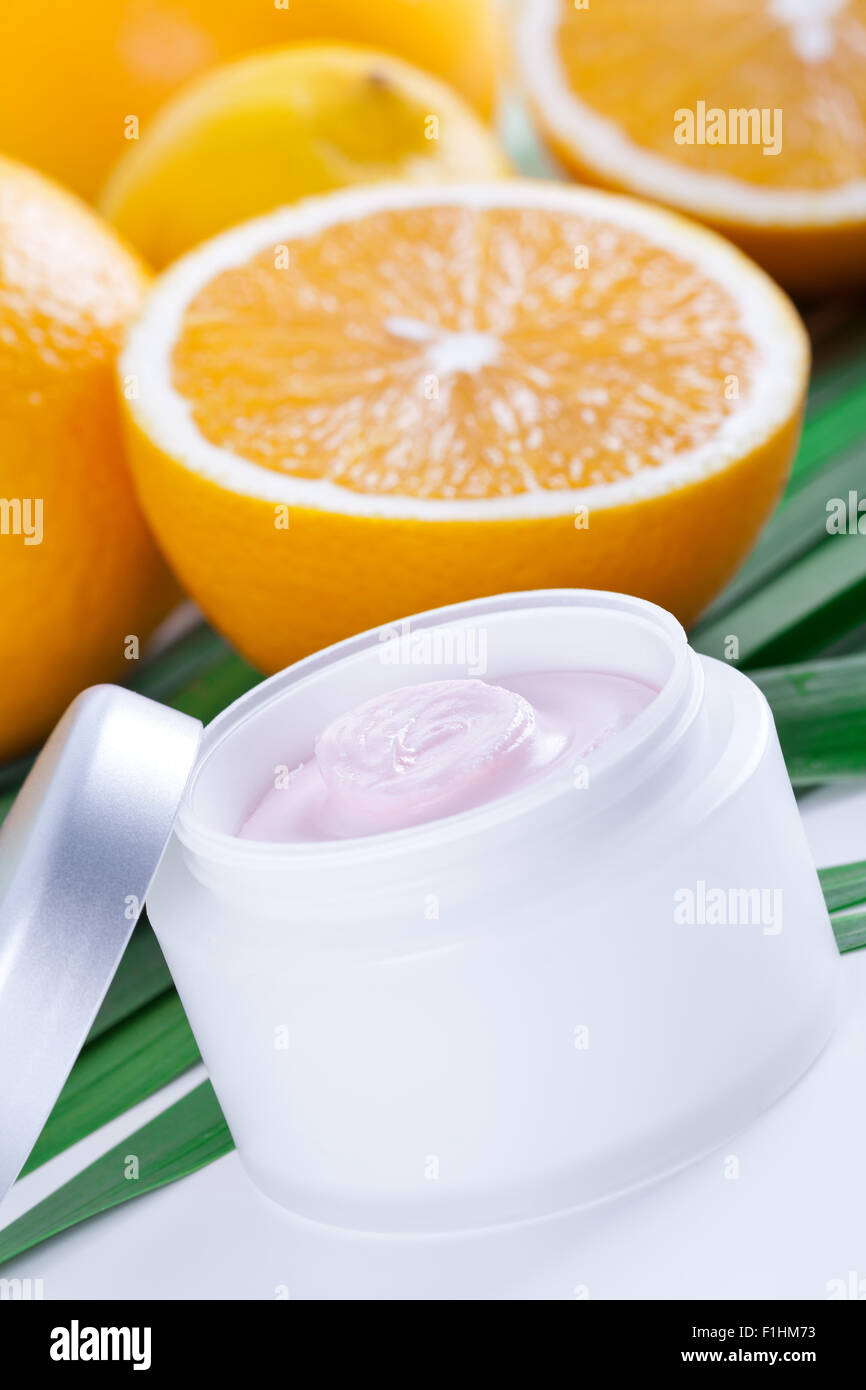 Facial cream with vitamin C, Orange fruit skincare Stock Photo Alamy