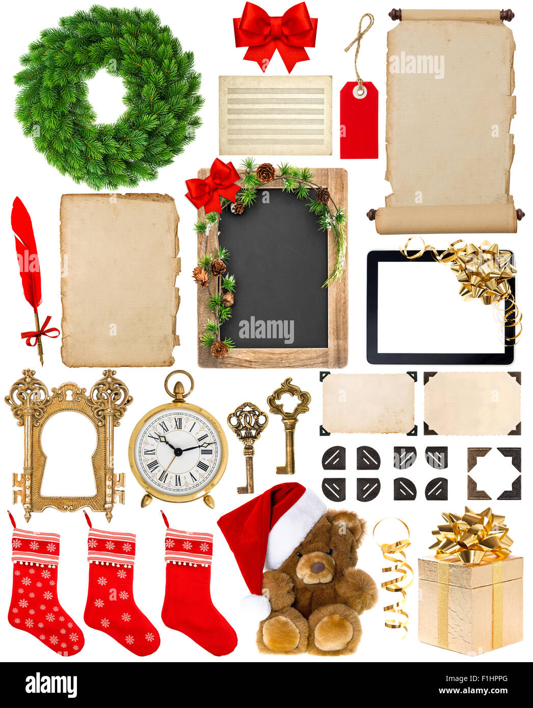 Christmas decorations, ornaments and gifts. Old book pages, paper, wreath, scroll, blackboard, corner and photo frame isolated o Stock Photo