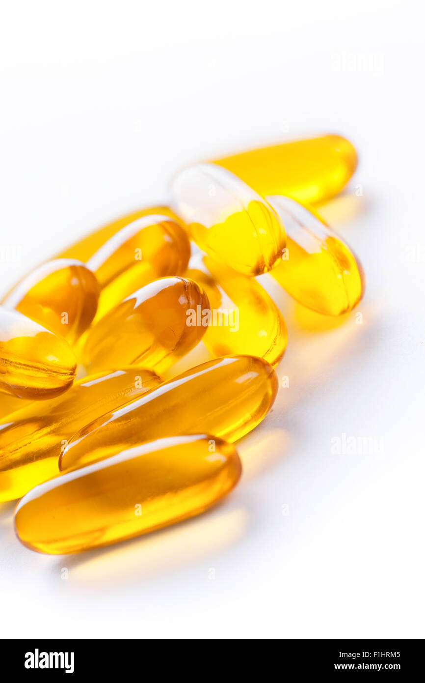 Soft gels pills with Omega-3 oil on white Stock Photo