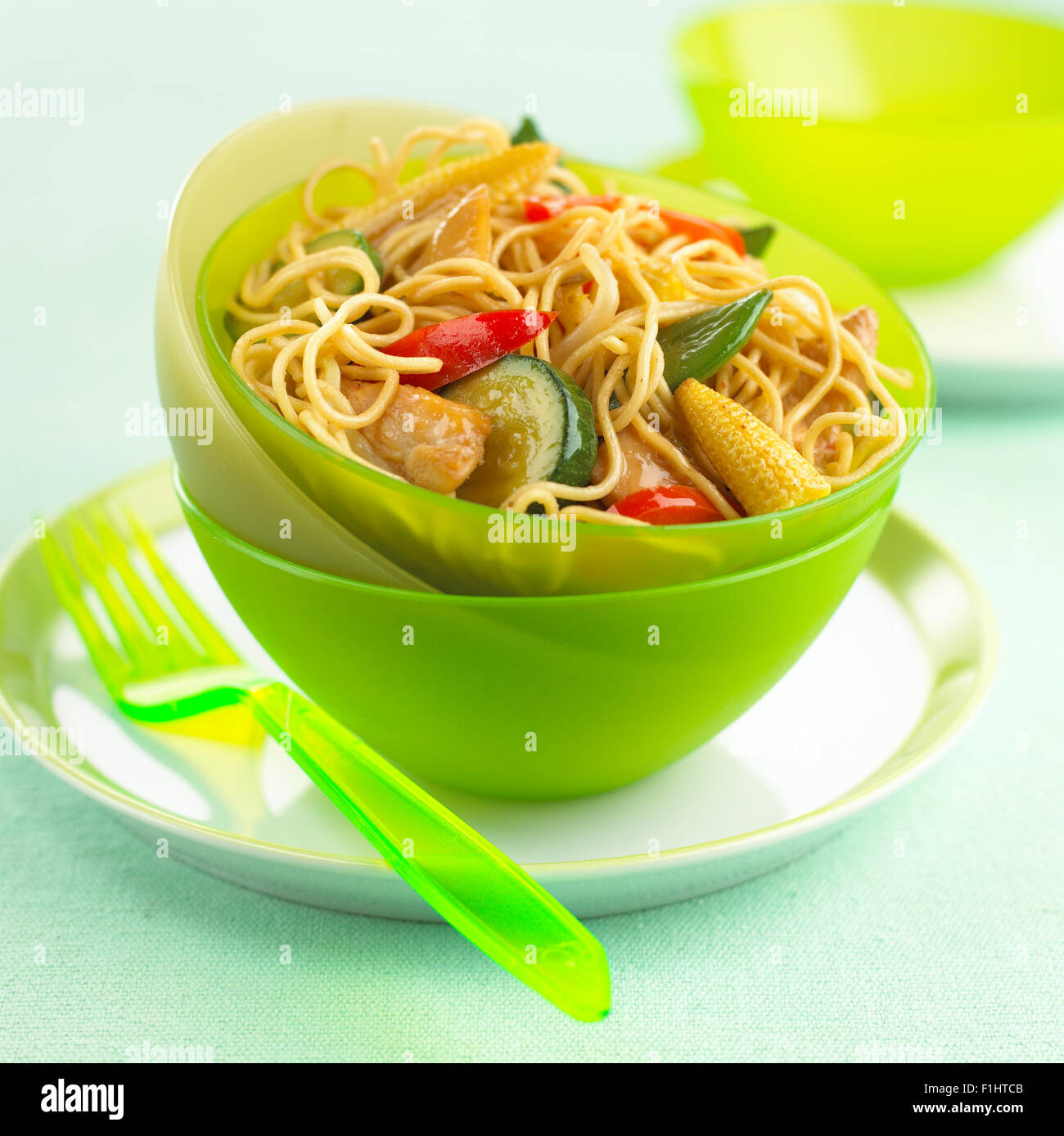 Chicken stir fry in bowl, close up Stock Photo
