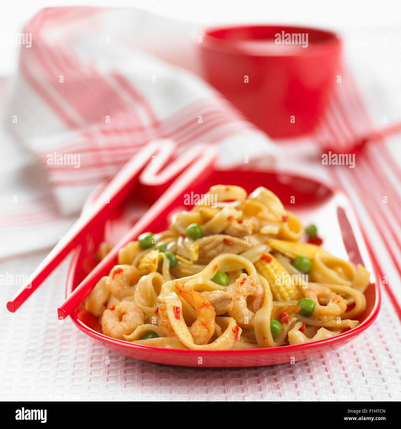 Flat noodle stir fry, close up Stock Photo