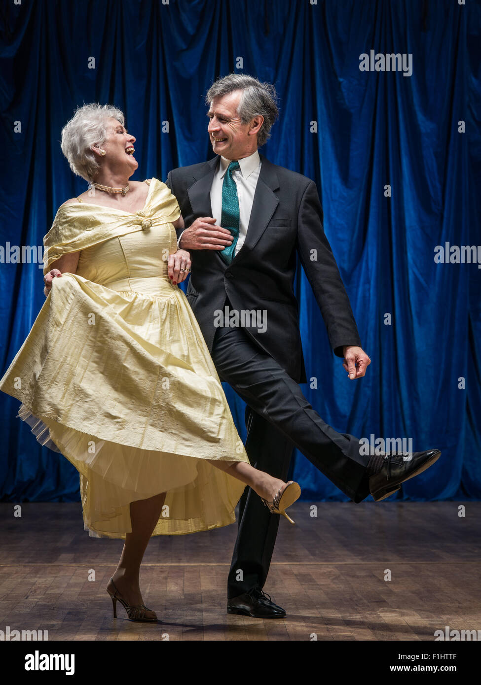 senior couple dancing in ballroom Stock Photo