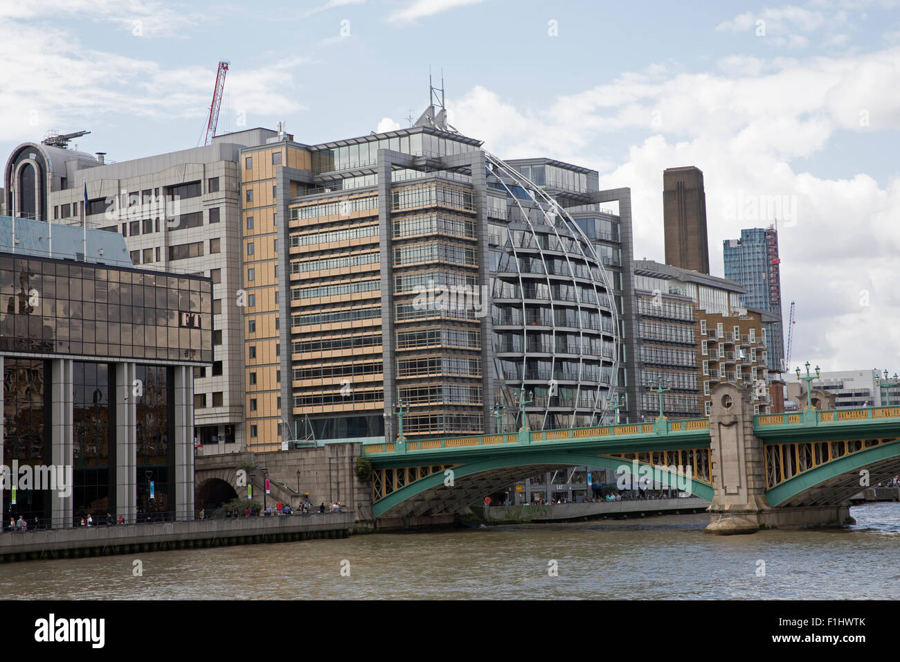 Riverside apartments and office buildings as seen from the River Thames ...