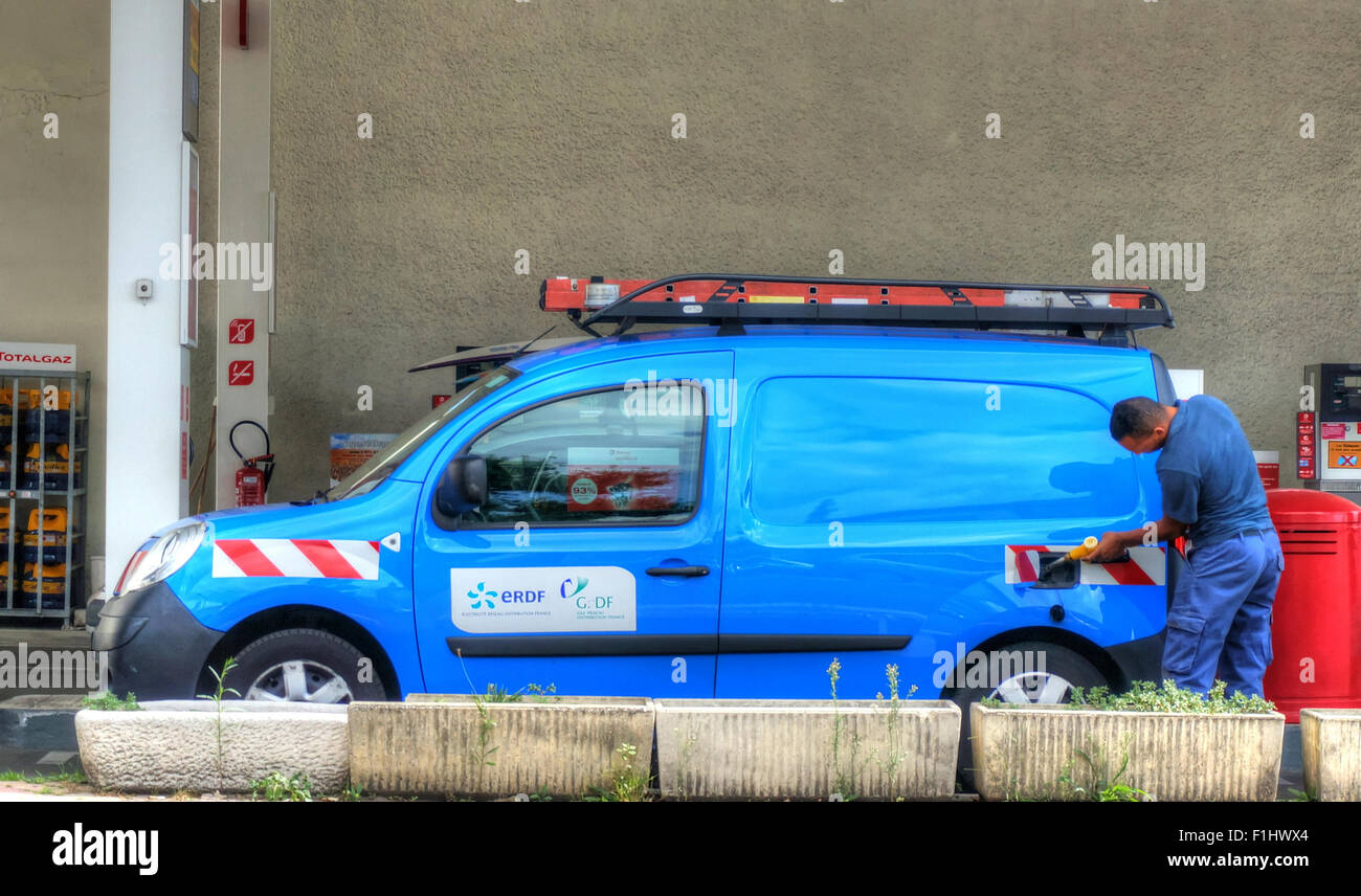 BORDEAUX, FRANCE, SEP 01,2015 a man driver fills up his car at the Petrol Station Stock Photo