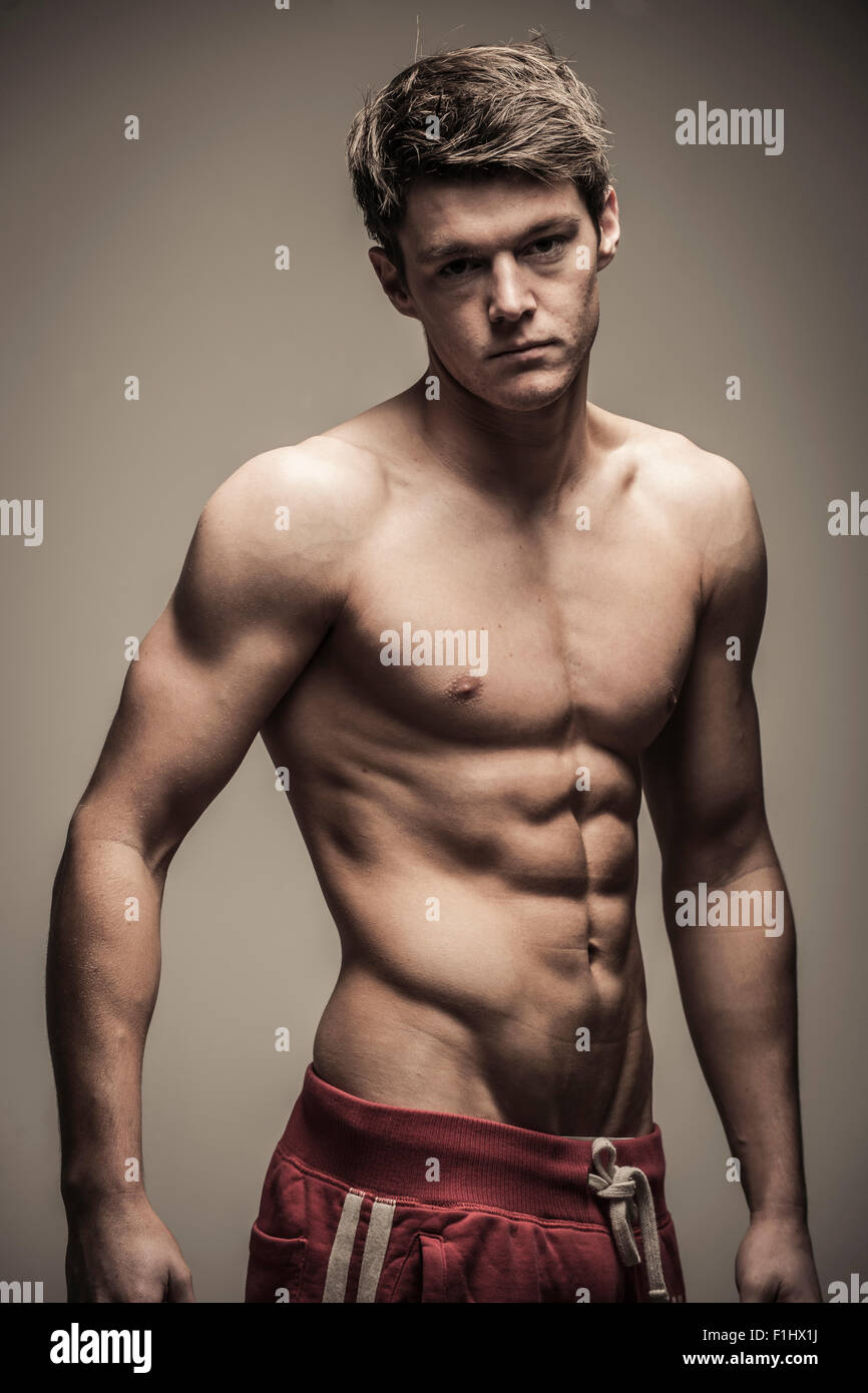 Young male with fit body Stock Photo - Alamy