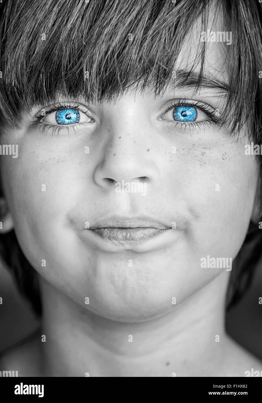 insightful look blue eyes boy Stock Photo Alamy