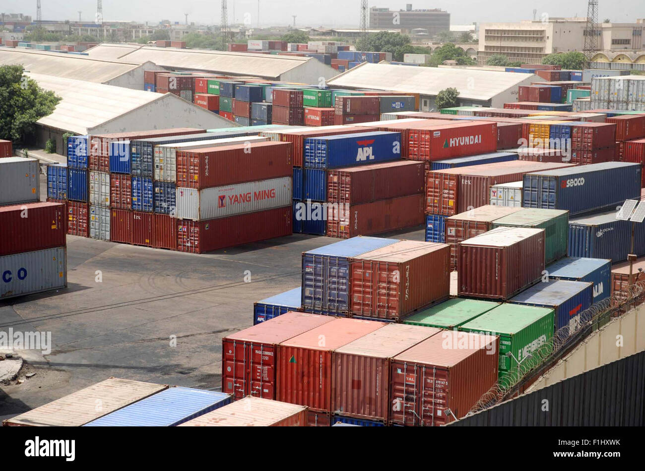 Larger numbers of containers of imported goods can be seen at Karachi Port whereas the Karachi