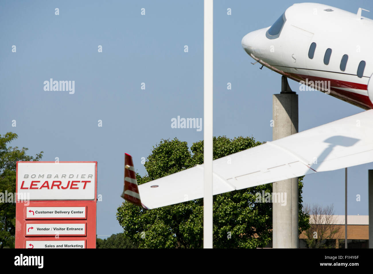 A logo sign outside of the headquarters of the Bombardier Learjet