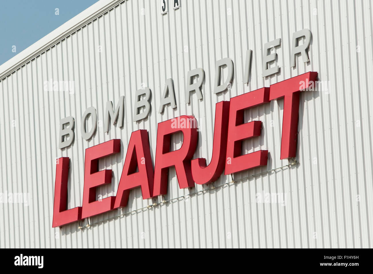A logo sign outside of the headquarters of the Bombardier Learjet