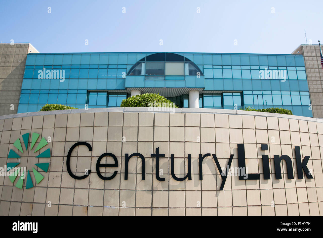 A logo sign outside of a facility occupied by CenturyLink, Inc., in New Century, Kansas, on August 22, 2015. Stock Photo
