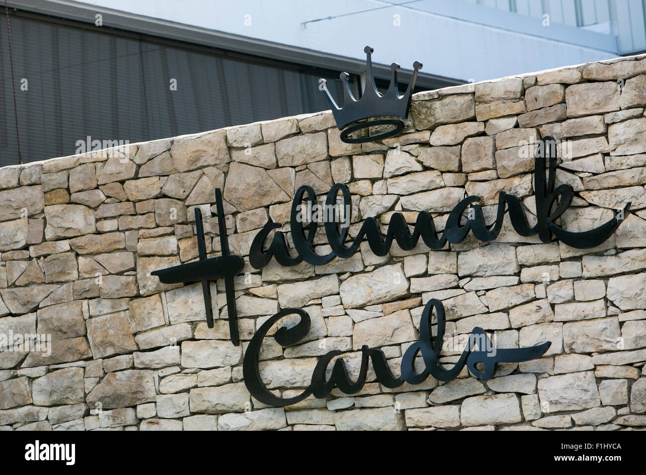 A logo sign outside of a facility occupied by Hallmark Cards in