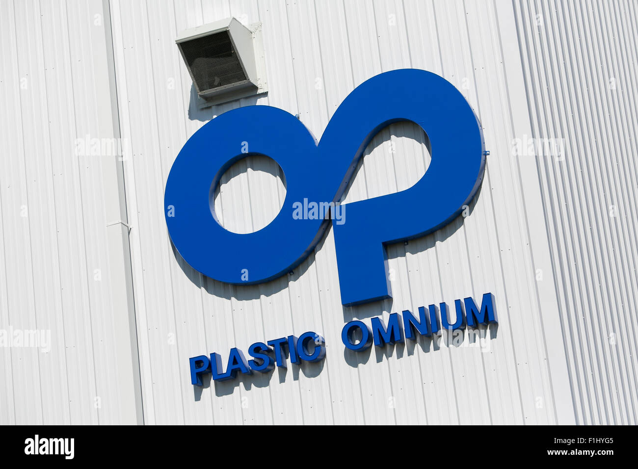 A logo sign outside of a facility occupied by Plastic Omnium in Kansas City, Kansas on August 23, 2015. Stock Photo