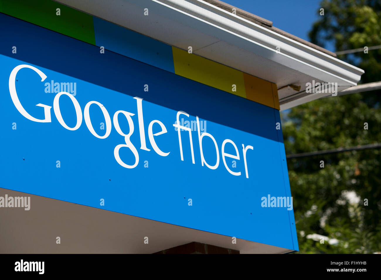 A logo sign outside of a Google Fiber sales office in Kansas City, Missouri on August 23, 2015. Stock Photo