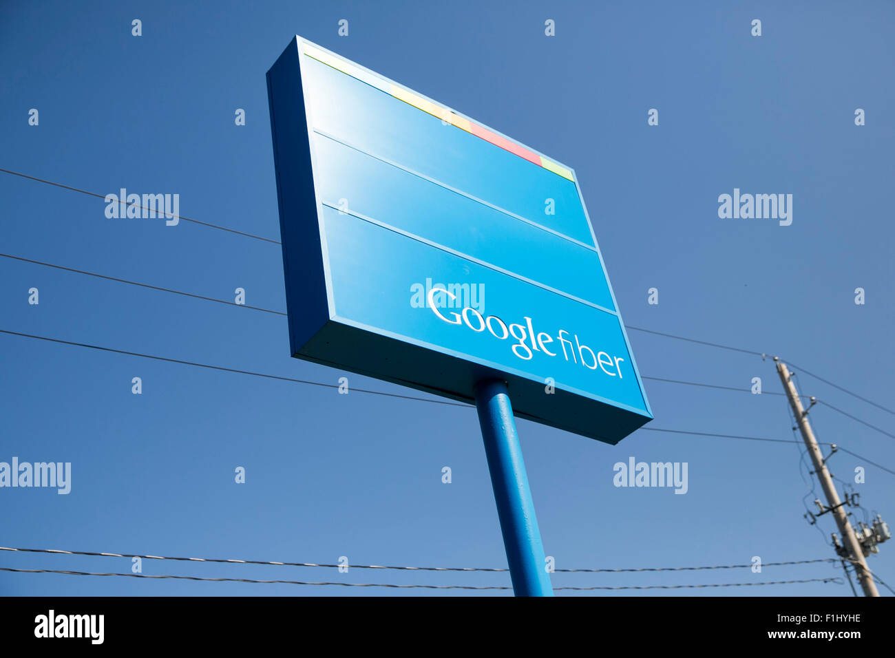 A logo sign outside of a Google Fiber sales office in Kansas City, Missouri on August 23, 2015. Stock Photo