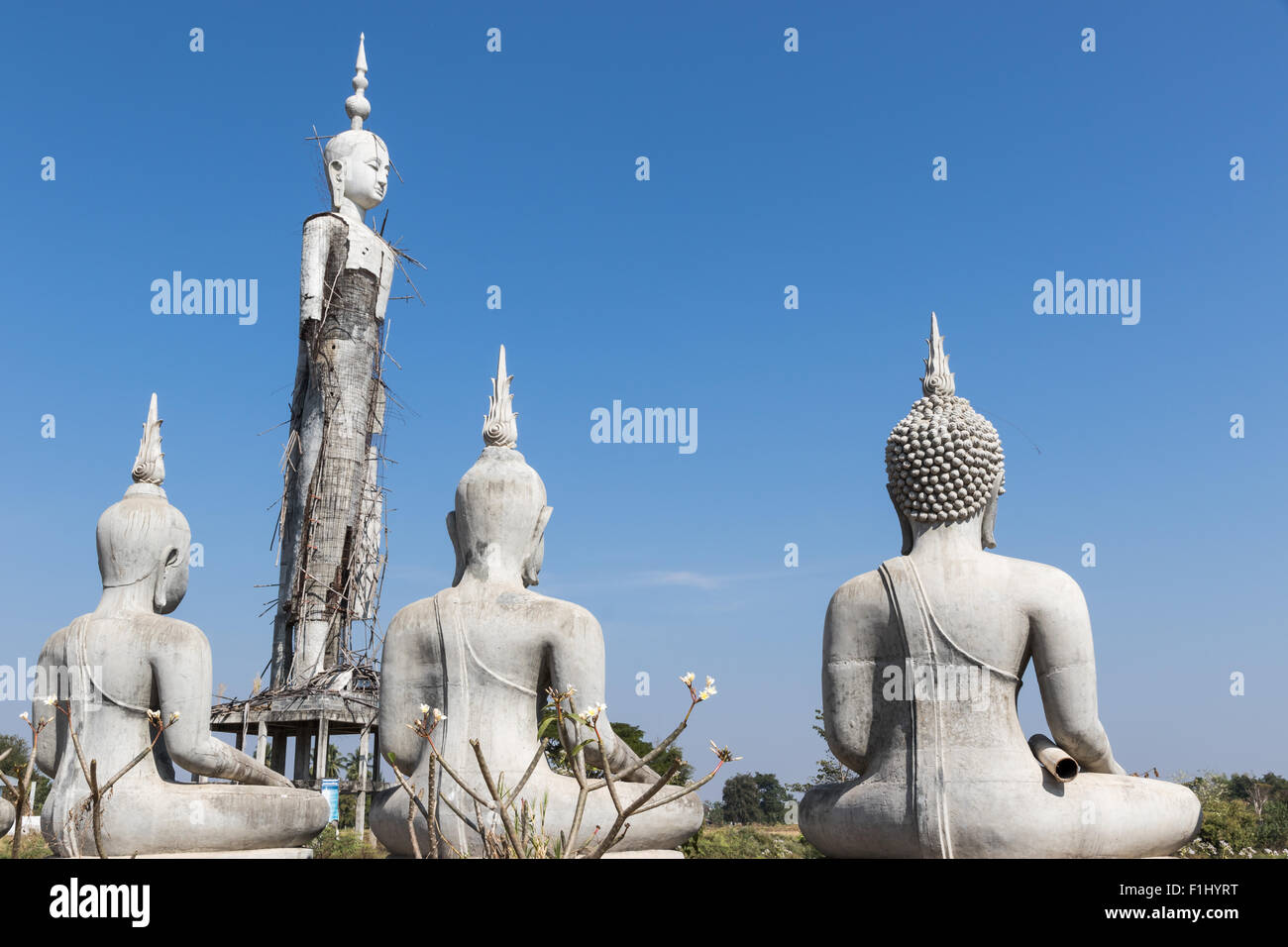 Old Buddha statue to the worship, or regarded as the dwelling place, of a god or gods or other objects of religious reverence. Stock Photo