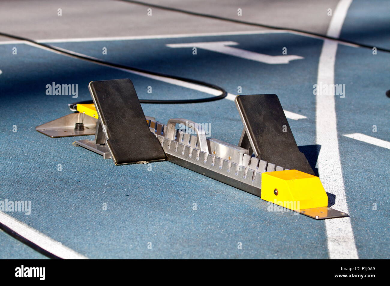 Closeup of starting block on running track Stock Photo Alamy