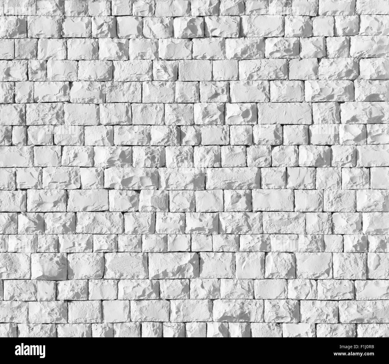 Background of white stone wall texture Stock Photo