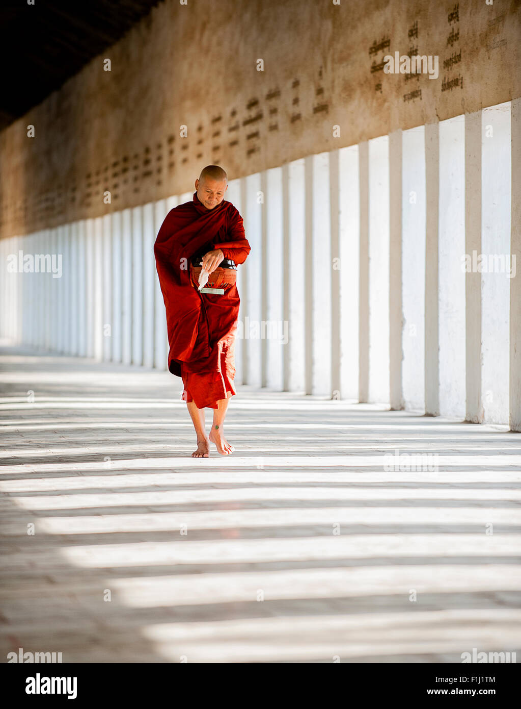 Buddist Monk with Alms, Bagan Myanmar Burma Stock Photo