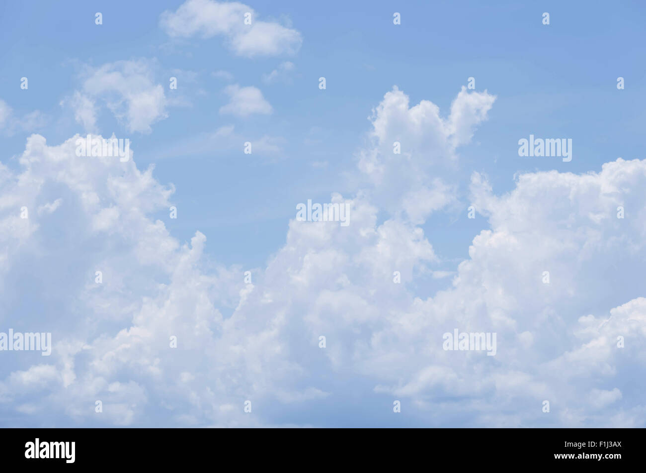 white clouds in the blue sky background Stock Photo - Alamy