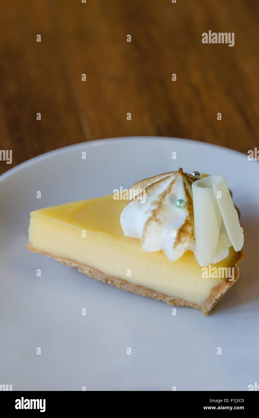 Slice of new york style cheesecake on the plate Stock Photo