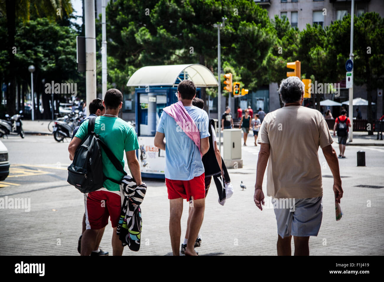 Group of young people going to the beach, Barcelona Stock Photo