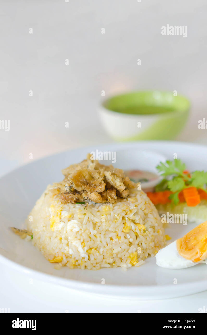 Chinese cuisine, fried rice with fish , salted egg and fresh vegetable ...