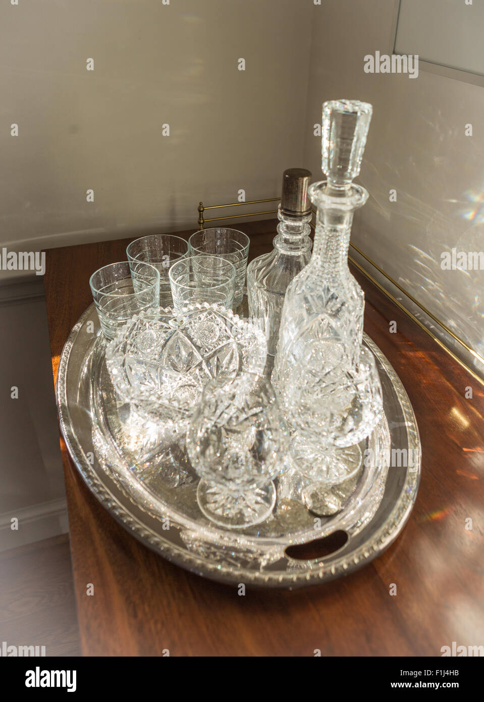 VIRGINIA, USA - Crystal glass on silver platter. Stock Photo