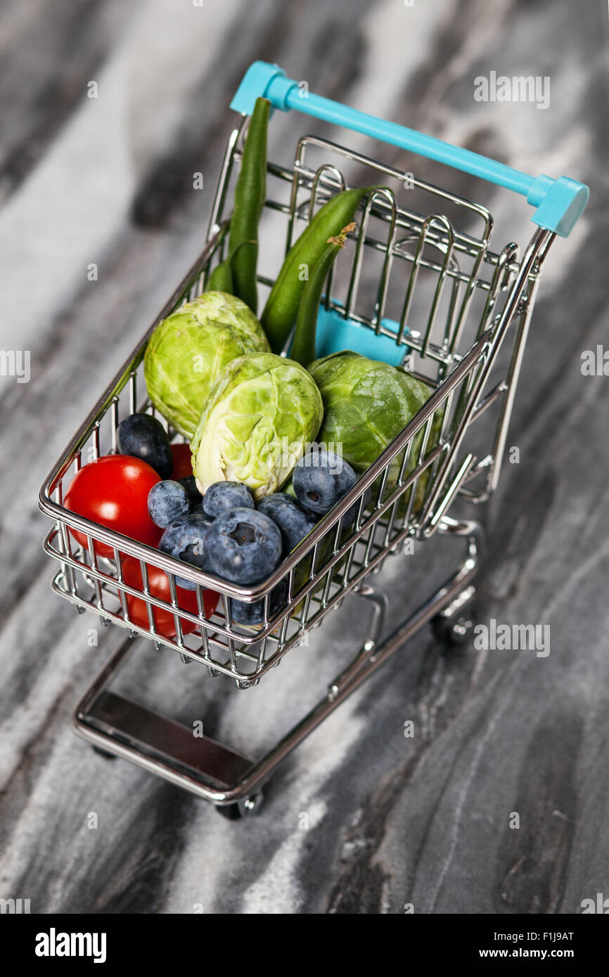 Shopping cart with vegetables Stock Photo Alamy