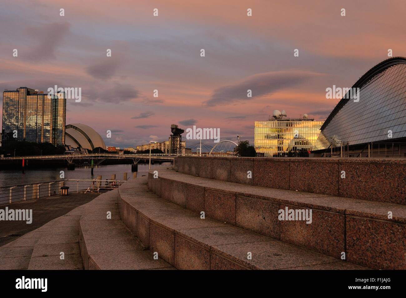 Glasgow, Scotland, UK. 02nd Sep, 2015. Sunset over the River Clyde, with the Clyde Arc, known locally as the Squinty Bridge, the Finnieston Crane, the BBC and the Science Centre, lit up by the sun. Credit:  Tony Clerkson/Alamy Live News Stock Photo