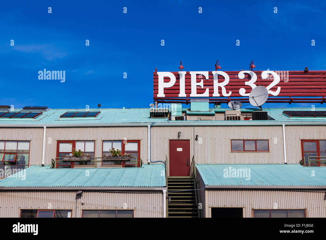 Roof line of modern offices in an older industrial building on