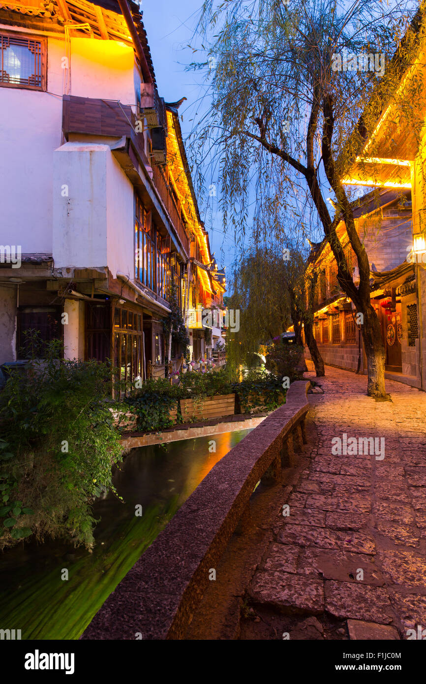 Lijiang old town in early evening in Yunnan Province, China Stock Photo ...