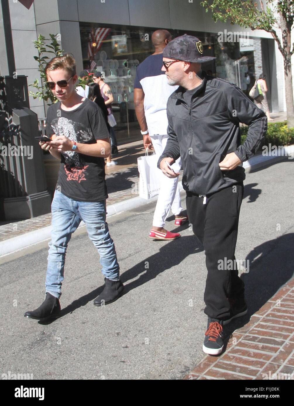 Fred Durst takes his son Dallas Durst shopping at The Grove Featuring
