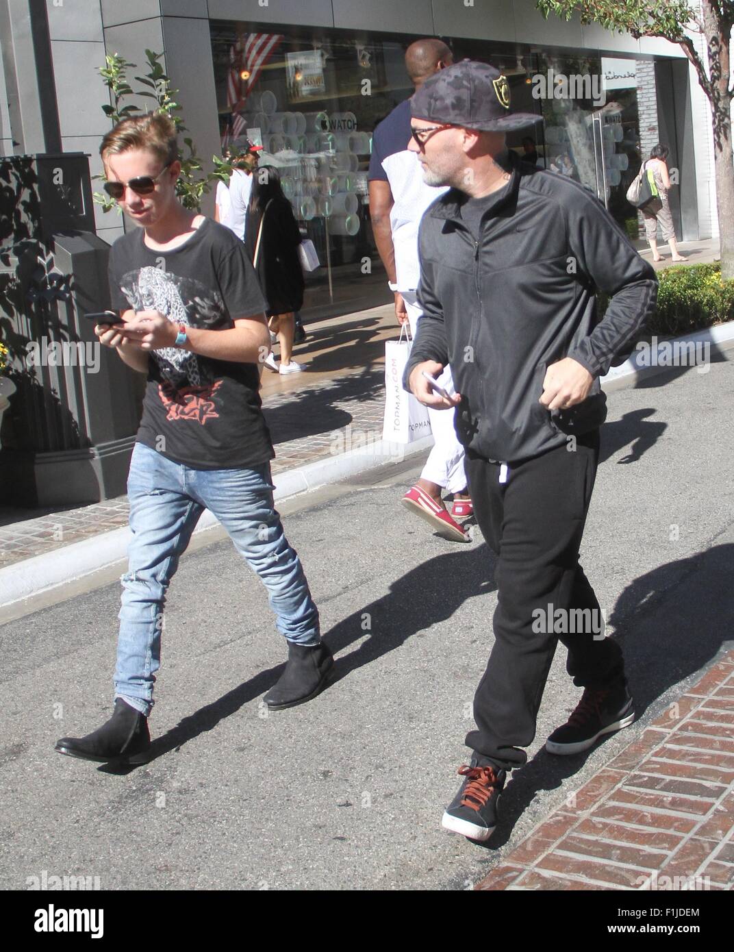 Fred Durst takes his son Dallas Durst shopping at The Grove Featuring ...