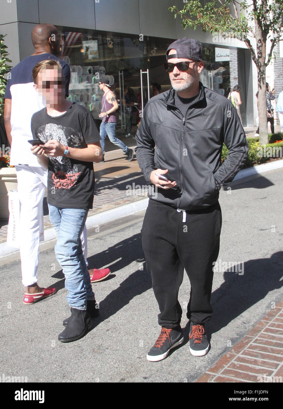 Fred Durst takes his son Dallas Durst shopping at The Grove Featuring ...