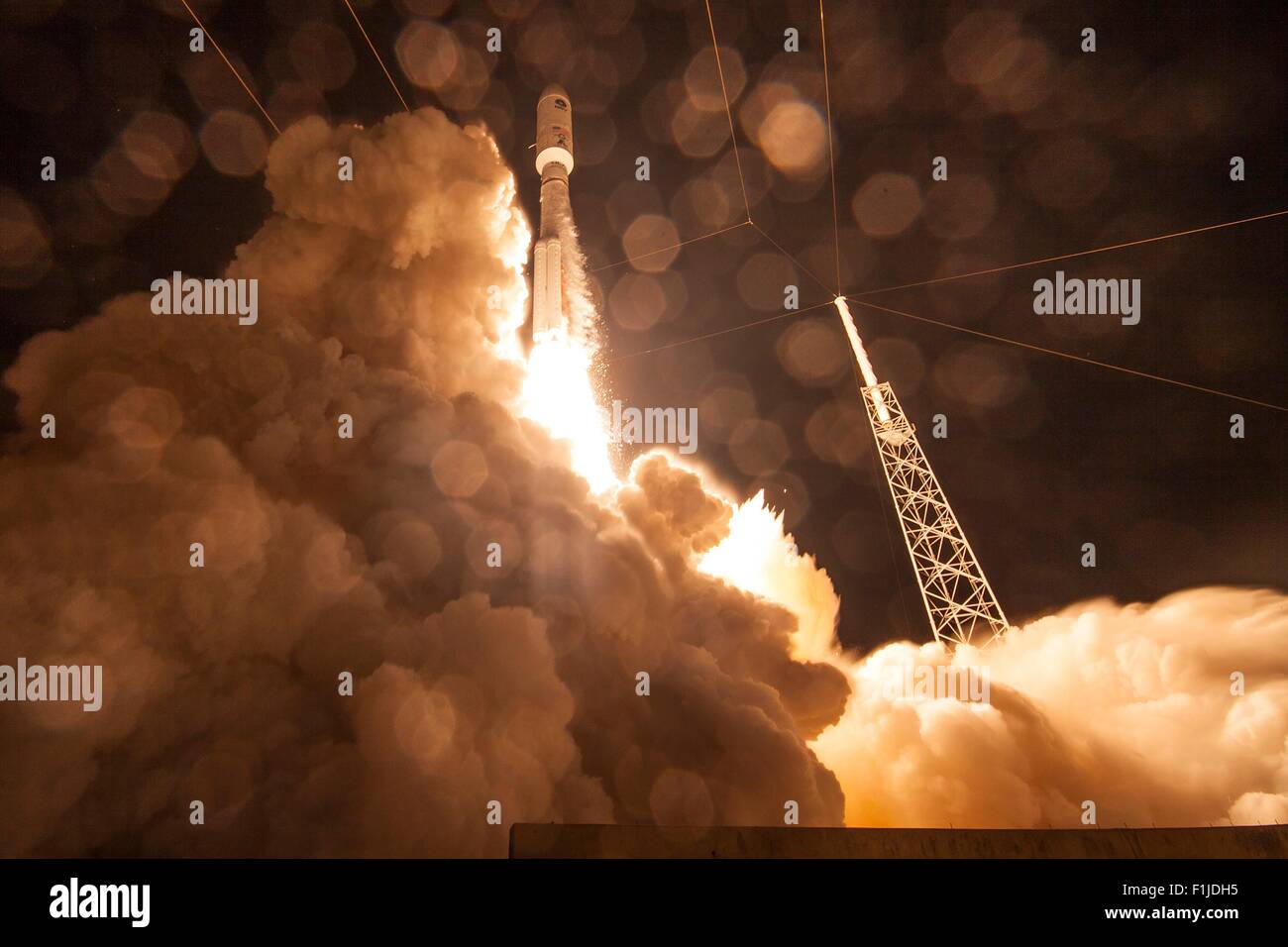 Cape Canaveral, Florida, USA. 1st Sep, 2015. A United Launch Alliance Atlas V rocket carrying the Navy fourth Mobile User Objective System satellite blasts off from Space Launch Complex-41 September 2, 2015 in Cape Canaveral, Florida. Stock Photo