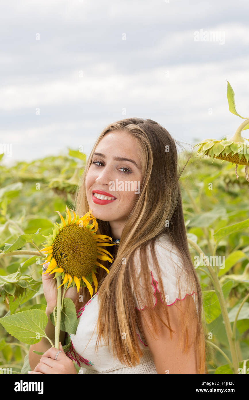 Girl with sunflower Stock Photo - Alamy