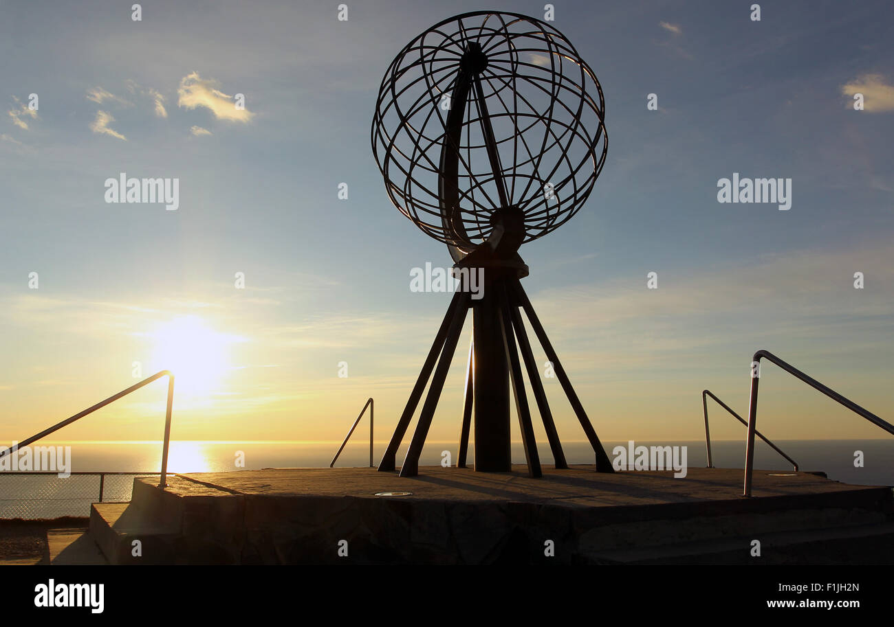 Globe, world globe made of steel, at sunset, North Cape, Norway Stock Photo